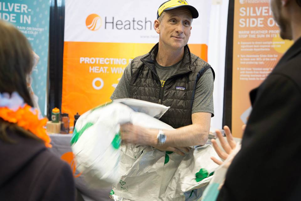 Heatsheets President Chris Falk talking starting line warming at the 2015 Shamrock Shuffle Expo.